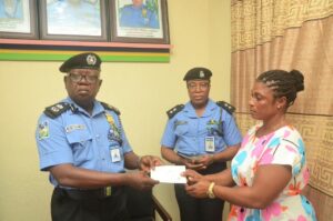 Cross River CP Ajo Geoffrey presents ₦13.75m Group Life Assurance cheques to families of 17 deceased police personnel
